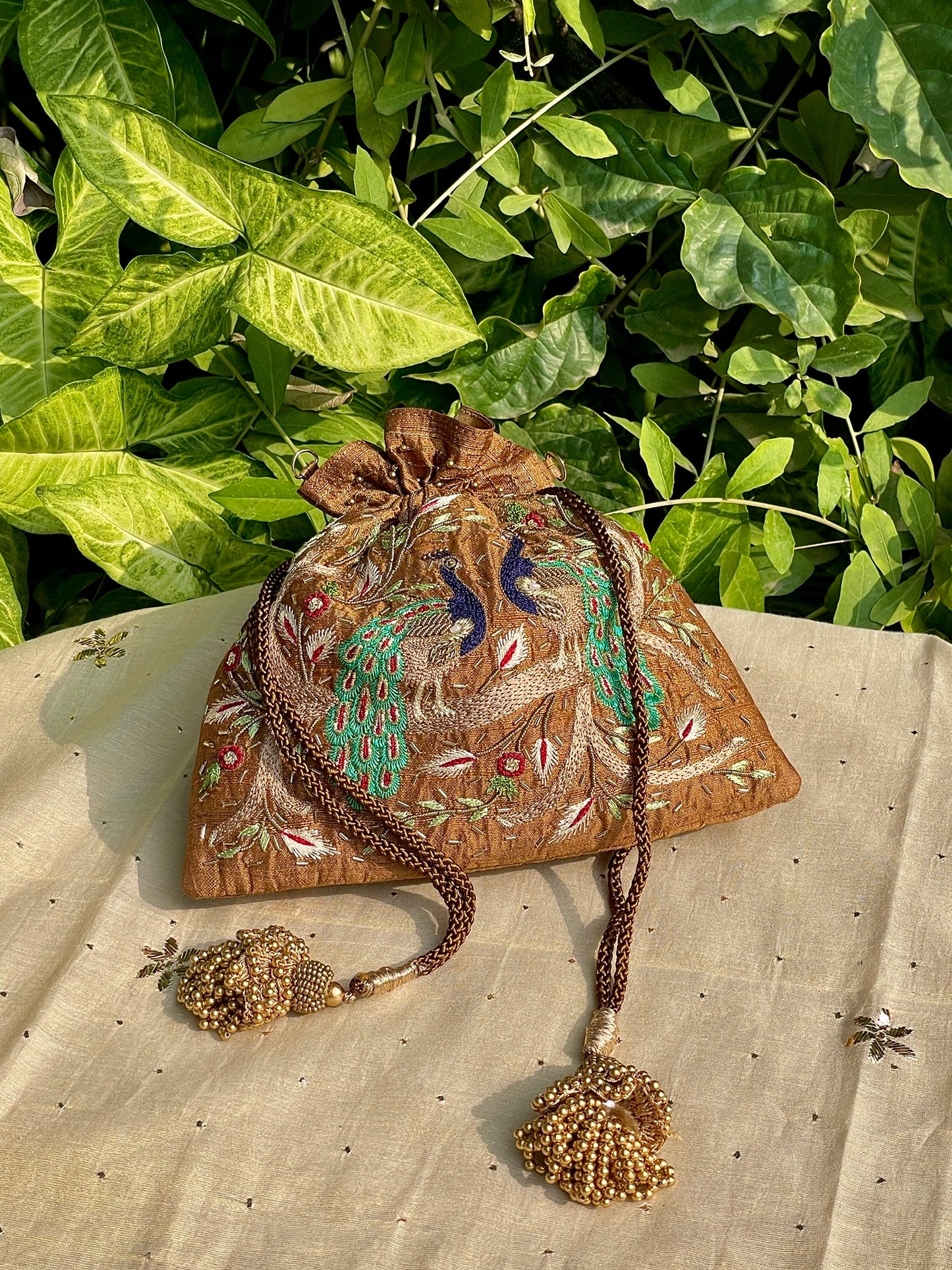 Mustard Raw Silk Peacock Motif Zardosi Polti Bags