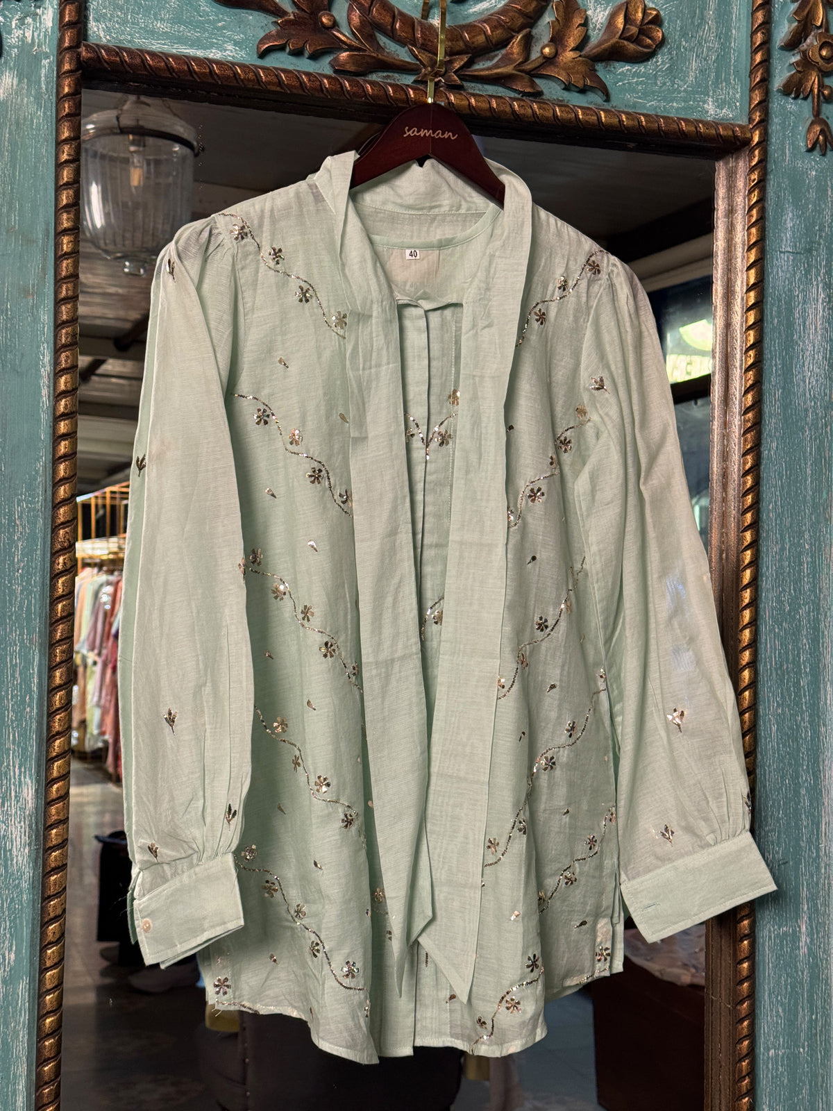 Sea Green Shade Mul Chanderi Mukaish Badla Short Shirt with Bow Neck