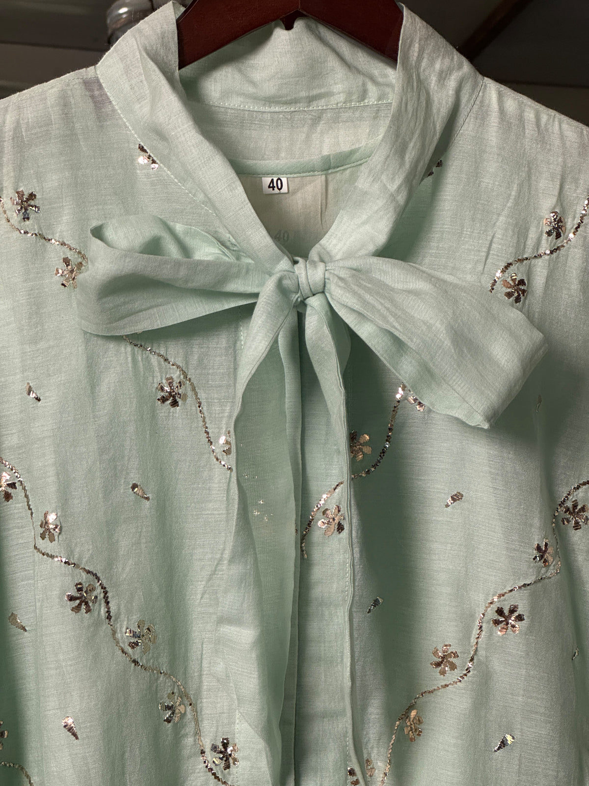 Sea Green Shade Mul Chanderi Mukaish Badla Short Shirt with Bow Neck