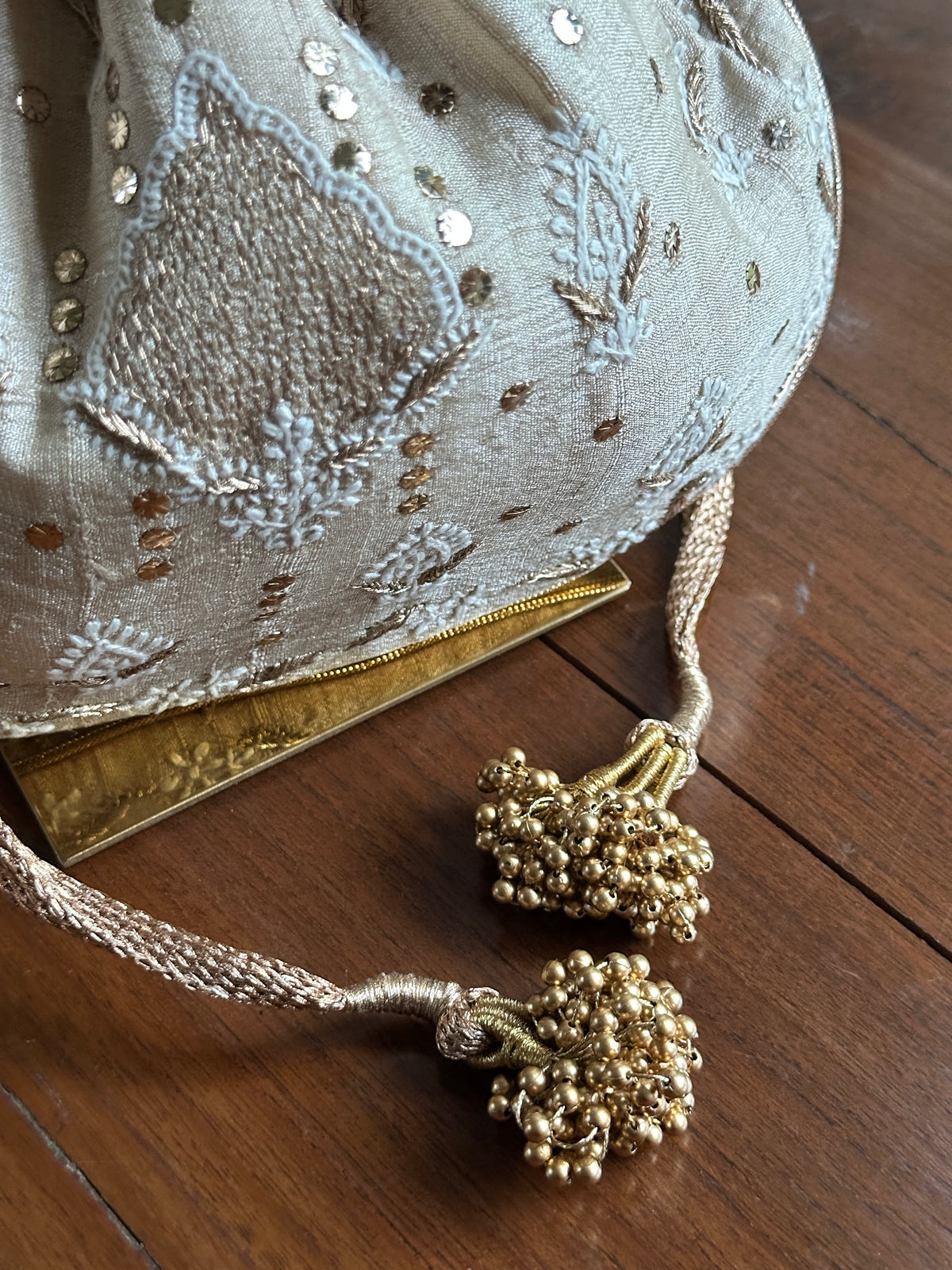 Beige Silk Chikankari Ari & Kasab Work Potli Bag