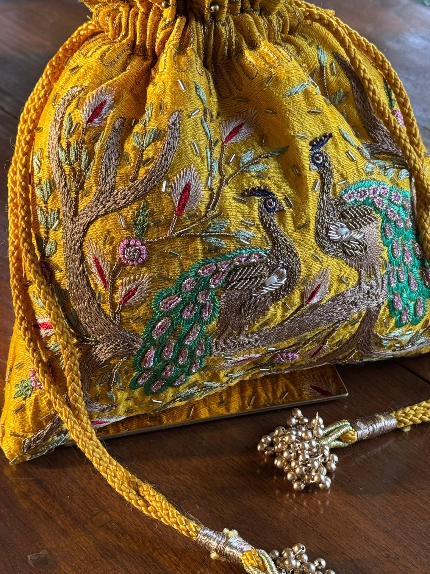 Mango Yellow Raw Silk Peacock Motif Zardosi Polti Bags
