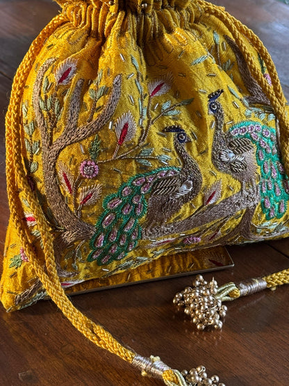 Mango Yellow Raw Silk Peacock Motif Zardosi Polti Bags