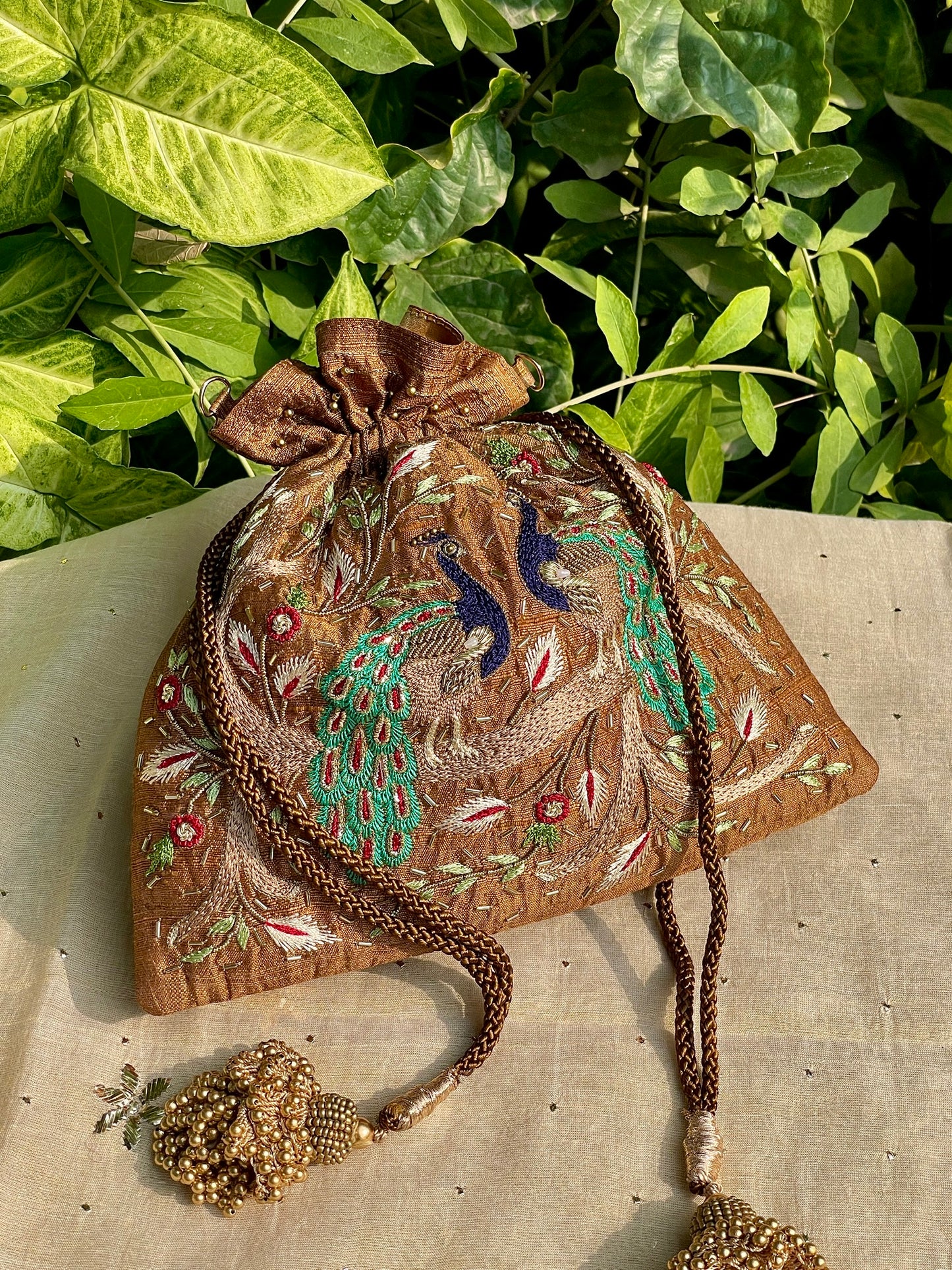 Mustard Raw Silk Peacock Motif Zardosi Polti Bags