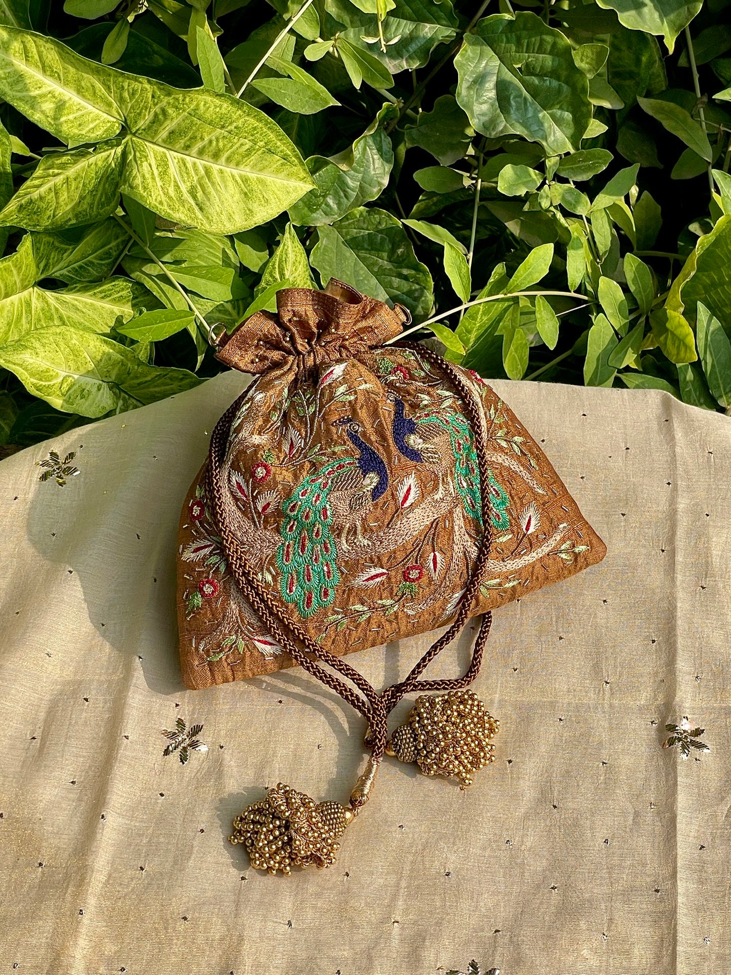 Mustard Raw Silk Peacock Motif Zardosi Polti Bags