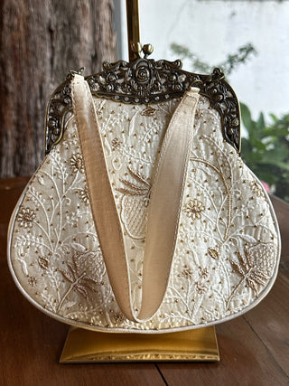Off White Shade Rose Motif Vintage Ari Sling Bags