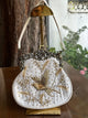 Off White Shade Vintage Bird Motif Ari Sling Bags