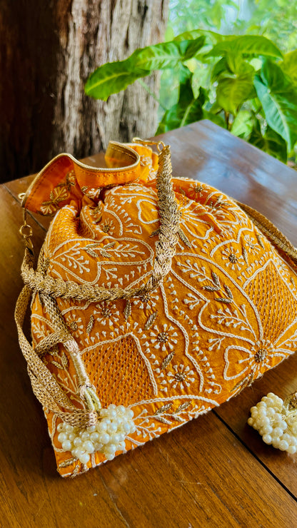 Orange Raw Silk Chikankari Polti Bags